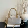Bolsa de ombro grande de estilo europeu e americano, soft-shell, nova para 2026, transfronteiriça, bolsa transversal moderna e versátil para o dia a dia, bolsa feminina