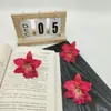 Venta al por mayor de fábrica Venta caliente transfronteriza Flores artificiales Orquídeas tailandesas Sombreros de flores Zapatos con flores Tocados festivos Flores para la cabeza Flores falsas