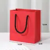 Bolso de mano simple de color liso bolsa de papel caja de joyería a juego bolsa de regalo regular bolsa de embalaje para caja de joyería de pulsera