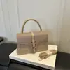 Otoño 2026 Nueva Moda Texturizada Moderna Cuadros Simple Elegante Versátil Hombro Cruzado de Mano Pequeña Cuadrada