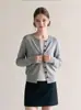 Cardigan de tricô elegante com blocos de cor e mangas compridas para mulheres, nova coleção de outono 2026, solto e casual, perfeito como camada base