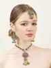 Conjunto de joyería de tocado, aretes y collar con borla y cascabel estilo indio transfronterizo; conjunto de joyería incrustado de pedrería