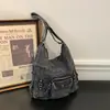 Bolsa de mezclilla casual de gran capacidad para mujer, nuevo modelo 2026, mochila para la ciudad, bolso de hombro y cruzado multiusos, moderno