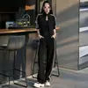 Conjunto deportivo casual para mujer, nueva colección de otoño, chaqueta a rayas de corte holgado con cuello alto, pantalones versátiles de pierna ancha, efecto adelgazante, conjunto de dos piezas