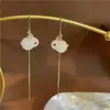 Diseño único Conejo de Jade pendientes anti-pérdida sentido de alta calidad nicho lujo ligero pendientes largos simples femeninos 2022 pendientes estilo nacional