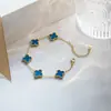 Set de trébol de cuatro hojas de acero de titanio de doble cara transfronterizo de Amazon: pulsera, collar, pendientes, anillo, juego de cuatro piezas, joyería que no se decolora