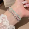 Pulseira geométrica oval com fecho de zircônia estilo francês, luxo leve com toque de alta qualidade, pulseira requintada com design simples, joia de nicho para mulheres