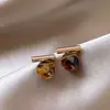 Brillo Ámbar Ojo de Tigre Retro Pendientes de Alta Gama Otoño/Invierno Pinzas para Orejas en Espiral para Mujeres Sin Perforaciones Aretes Únicos de Lujo Ligero