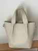 Bolsos Retro de Nicho para Mujer 2026 Nueva Moda Bolso de Mano de Alto Valor para el Trabajo Bolso Cruzado tipo Cubo