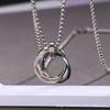 Collar de acero inoxidable de moda para hombres y mujeres cadena de suéter Sansheng III tres anillos anillo de acero inoxidable anillo entrelazado venta al por mayor