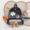 Mochila de ensino fundamental com estampa de bolinhas para meninas, grande capacidade, temática de anime, transparente, com um design fofo, adequada para carregar livros