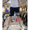 Pantalones cortos de verano de seda helada finos de secado rápido de cuatro barras para hombre estilo coreano modernos casuales pantalones de playa shorts deportivos para jóvenes