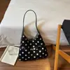 Bolso de mano minimalista de lunares Shuai Mijia, nueva colección 2026, un bolso de mano y bolso de hombro casual único y elegante