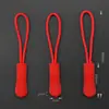 Tiradores de cremallera moldeados por inyección de TPU disponibles para venta al por mayor en múltiples colores, adecuados para chaquetas, mochilas, bolsos, cordones y accesorios de ropa, con servicio de muestras disponible