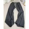 Pantalones de cuadros grises de calle para hombre, pantalones finos de ajuste relajado para primavera/verano, pantalones rectos de pierna ancha casuales americanos con una caída tipo algodón