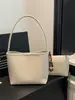 Bolsos populares para mujer de este año 2025 nuevo moderno moda retro bolso de hombro versátil para el día a día bandolera bolso tipo cubo