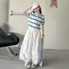 Conjunto de Camisa Polo Rayada y Pantalones Florales para Niñas, Nuevo Estilo Verano 2026 para Niños Mayores, Pantalones de Pierna Ancha Ligeros con Estampado de Corazones de Manga Corta