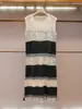 Shenzhen Nanyou Moda Femenina de Gama Alta Verano Nuevo Estilo Francés Diseño de Moda Vestido Camiseta Rayado con Tira Decorativa Hueca
