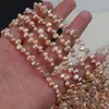 Suministro directo de fábrica collar de perlas de agua dulce naturales irregulares tipo pétalo pequeño barroco de 4-5 mm producto semiacabado