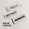 Etiquetas tecidas personalizadas para roupas, etiquetas de lavagem de roupas feitas sob medida, marcas registradas de marca, etiquetas de tecido tecidas personalizadas em pequenas quantidades