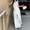 Moderna y versátil camiseta sin mangas tipo halter de estilo francés y pantalones casuales para mujer, conjunto casual fino de dos piezas para el verano 2026