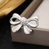 Pendientes de Acero Inoxidable con Lazo y Corazón para Mujer, Ins Europeo y Americano Transfronterizos Nueva Moda Lujo Ligero Minimalistas Versátiles