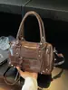 Bolsos transfronterizos 2026 otoño e invierno estilo motero vintage de gran capacidad bolso de mano bolso tote pequeño bolso cruzado de alta gama