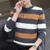 Nuevo suéter de punto a rayas con cuello redondo para hombre otoño e invierno 2026, suéter pullover holgado y moderno, capa base moderna y versátil
