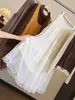 Falda de malla con ribete de encaje, nueva colección de otoño para mujer, de cintura alta, adelgazante, estilo coreano, elegante y deslumbrante falda larga de línea A con dobladillo acampanado.