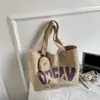 Bolsa de Lona Estilo Coreano Ins de Dibujos Animados para Mujer 2026 Nueva Gran Capacidad Estudiante Clase Viaje Versátil Bolso de Hombro Tote