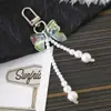 Llavero colgante de lazo de color fresco y dulce estilo coreano ins, moda para teléfono móvil, equipaje, cámara ccd, colgante pequeño