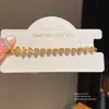 Pulsera con Cierre de Corazón de Circonia Chapada en Oro Real de 18k Pulsera de Lujo Ligero de Alta Gama Estilo Frío Personalidad Joyería de Mano Venta al por Mayor