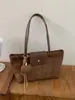 Bolsa Feminina Multi Frutas Estilo Pequena Fragrância Bloco de Cores Camurça Bolsa Tote Outono/Inverno 2026 Nova Retro Versátil Bolsa de Mão Ombro