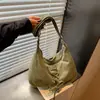Bolsa transversal minimalista retrô com laço transfronteiriça para mulheres, nova bolsa versátil de tecido para o dia a dia estilo bolinho 2026
