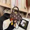 Bolso de mano tipo concha de moda transfronteriza fresco y dulce para mujer, nuevo de otoño 2026, bolso de hombro cruzado de lunares de lujo ligero