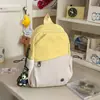 Mochila pequena portátil versátil para estudantes homens de grande capacidade em duas cores, bolsa de peito cruzada simples estilo japonês para mulheres