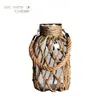 Funda de Botella de Vidrio Tejida con Ratán Transfronteriza Estilo Ins Adorno Tejido de Paja Decoración del Hogar Funda para Taza de Velas Aromáticas Tejidas Estilo Ins