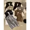 ULOUR/U Grão Outono Inicial Estilo Casual Coreano Patchwork Falso Duas Peças Gola Manga Curta Tricô J6131 (com bolsa pequena)