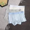 Roupa íntima masculina de Modal Sem costura Quatro cantos Tamanho grande Esportiva Confortável Moda para meninos Estilo simples Cuecas Boxers