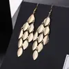 ¡Guau!Moda Transfronteriza Europea y Americana, Varios Pendientes Largos Metálicos de Borla Exagerada de Estilo Moderno con Elementos Elegantes