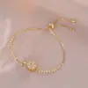 Collar para Mujer, Estilo Influencer Transfronterizo Flor de Girasol Circonita Giratorio Conjunto de Tres Piezas Decoración Collar de Acero de Titanio