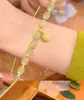 Pulsera de Loto Crudo Paso a Paso Pulsera de Azúcar Imitación Jade Natural Hetian Pulsera de Loto para Mujer Diseño Xia Xiaozhong Estilo Caliente de Tiktok