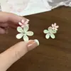 2026 Nuevos Pendientes de Perlas con Colgante de Flor con Goteo de Aceite Dulce, con un Toque de Lujo, Personalizados, Modernos, Versátiles