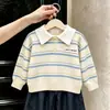 Ropa infantil estilo coreano 2026 colección otoño e invierno nueva: suéteres de punto y pantalones de pierna ancha con bloques de color elegantes y modernos para niños y niñas