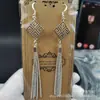 Brincos Mongóis femininos estilo étnico brincos de franja longa elementos mongóis joias de imitação de prata atacado