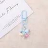 Chaveiro Urso com Laço de Bolinhas Coloridas Pingente Desenho Animado Fofo Acessório de Chaveiro com Contas Fornecimento de Produto Acabado