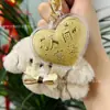 Llavero Dorado Corazón Trébol de Cuatro Hojas Princesa Amuleto de Buena Suerte Oro Puro 999 Peluche Año del Caballo Colgante Regalo Mayoreo
