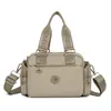Bolsa de Mão de Nylon para Lazer Transfronteiriça Novo Estilo Feminina Casual Simples Bolsa Transversal Moderna para Trabalho e Trajeto Bolsa de Ombro Único