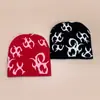 Nuevo patrón gorro de punto estilo europeo y americano de nicho para hombres y mujeres cálido personalidad hip-hop rap gorro pullover para exteriores venta al por mayor