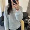 Suéter de Punto Hueco de Alta Gama Estilo Nicho Suave para Mujer Primavera y Otoño 2026 Nuevo Top de Punto Juvenil Holgado Adelgazante